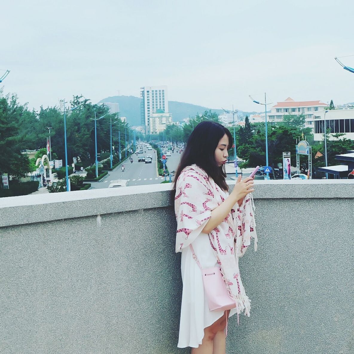 YOUNG WOMAN LOOKING AWAY