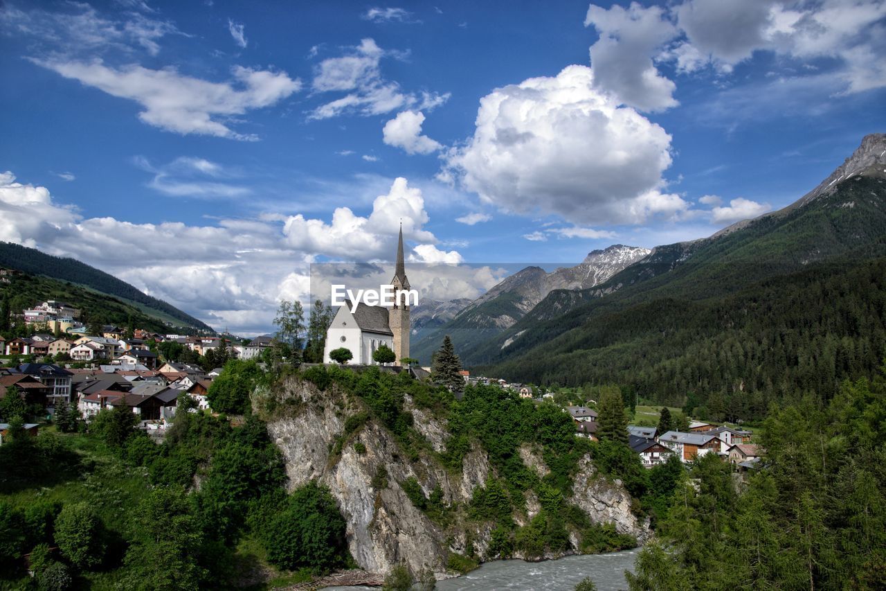 PANORAMIC VIEW OF BUILDINGS AGAINST SKY