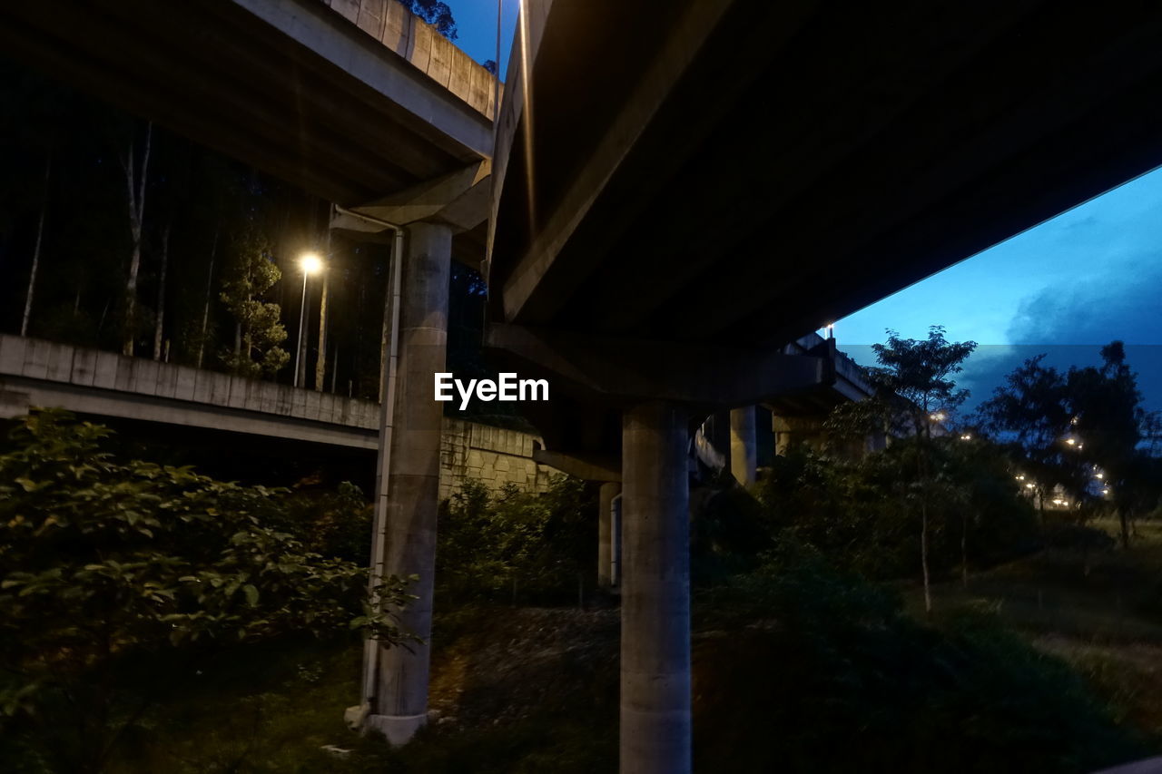 Low angle view of bridge at night