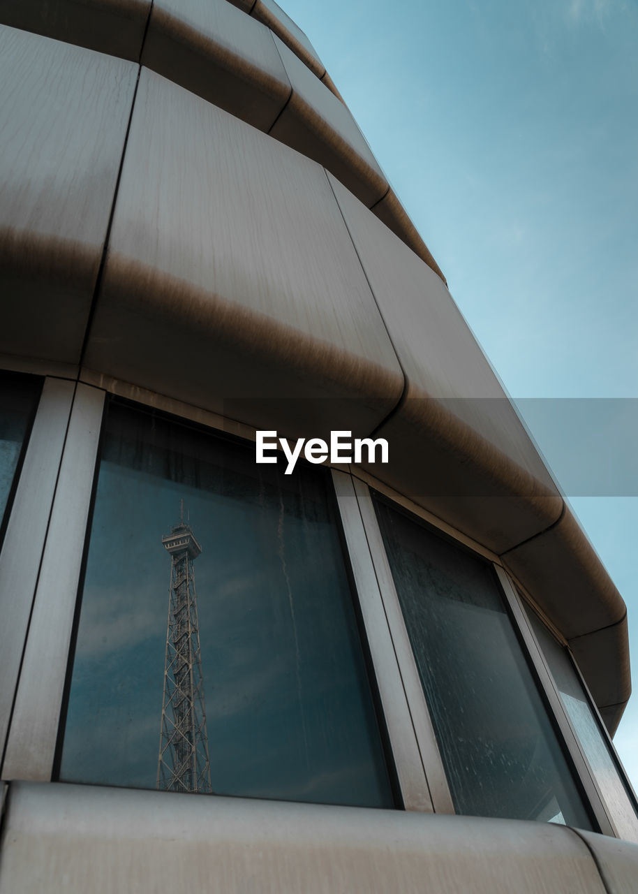 Low angle view of modern building against sky