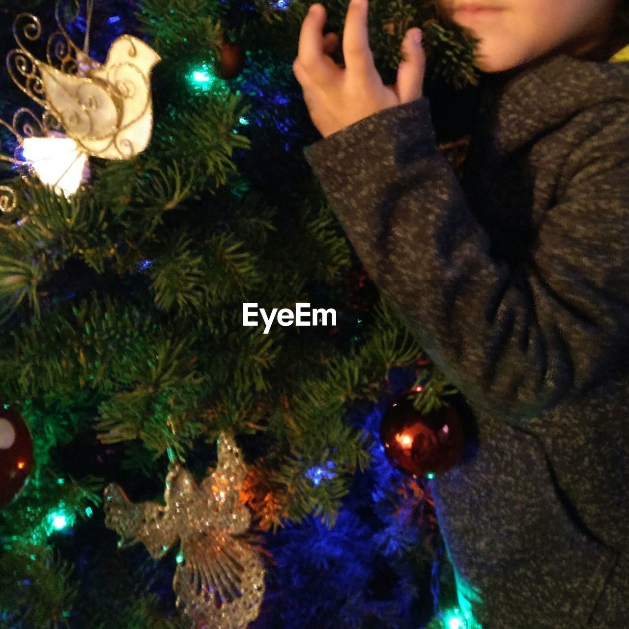 CLOSE-UP OF ILLUMINATED CHRISTMAS TREE