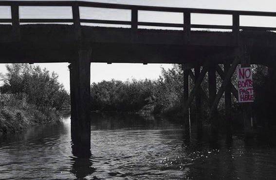 VIEW OF BRIDGE OVER RIVER