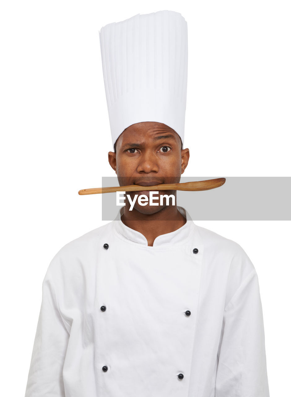 cook, white background, chef, portrait, uniform, cut out, studio shot, occupation, one person, chef's hat, clothing, looking at camera, person, adult, indoors, men, white, waist up, standing, chef's whites, front view, serious, young adult, emotion, food and drink, kitchen, professional occupation, business, food, headshot