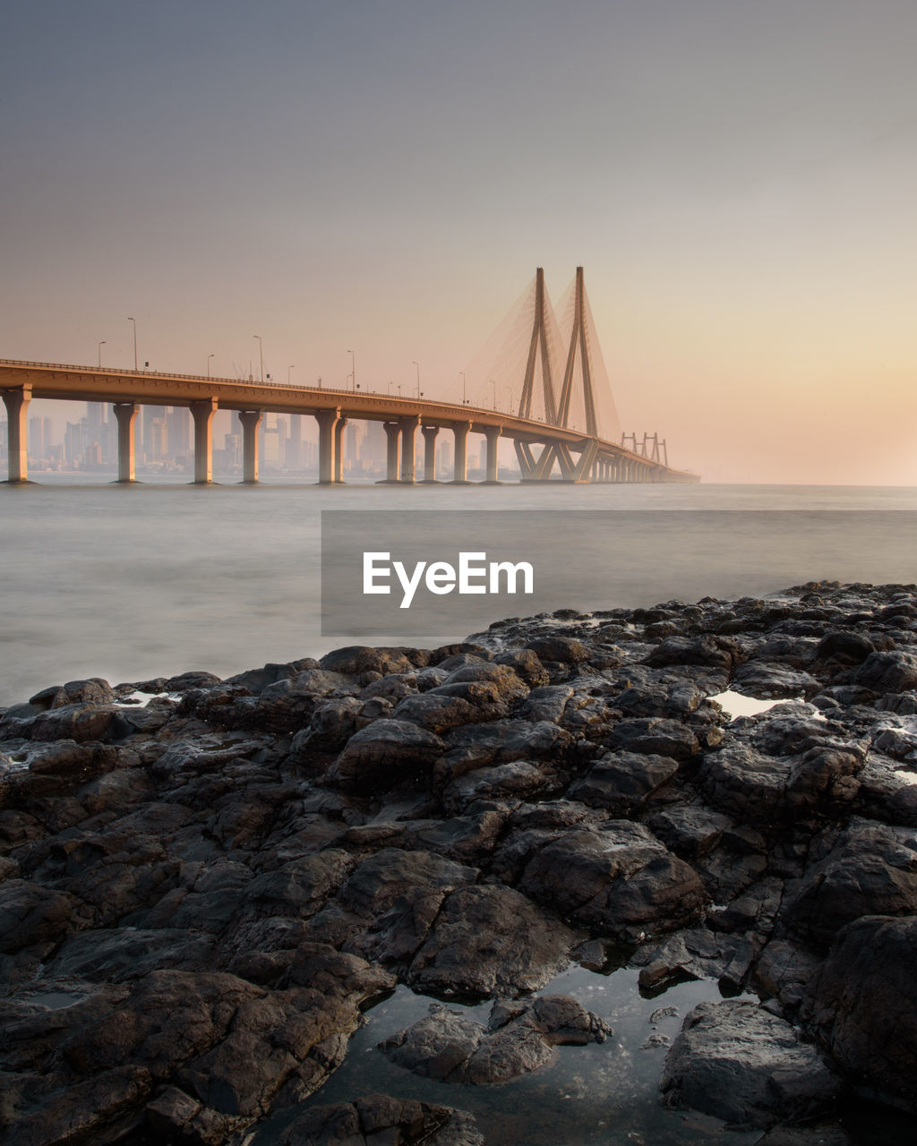 View of suspension bridge over sea