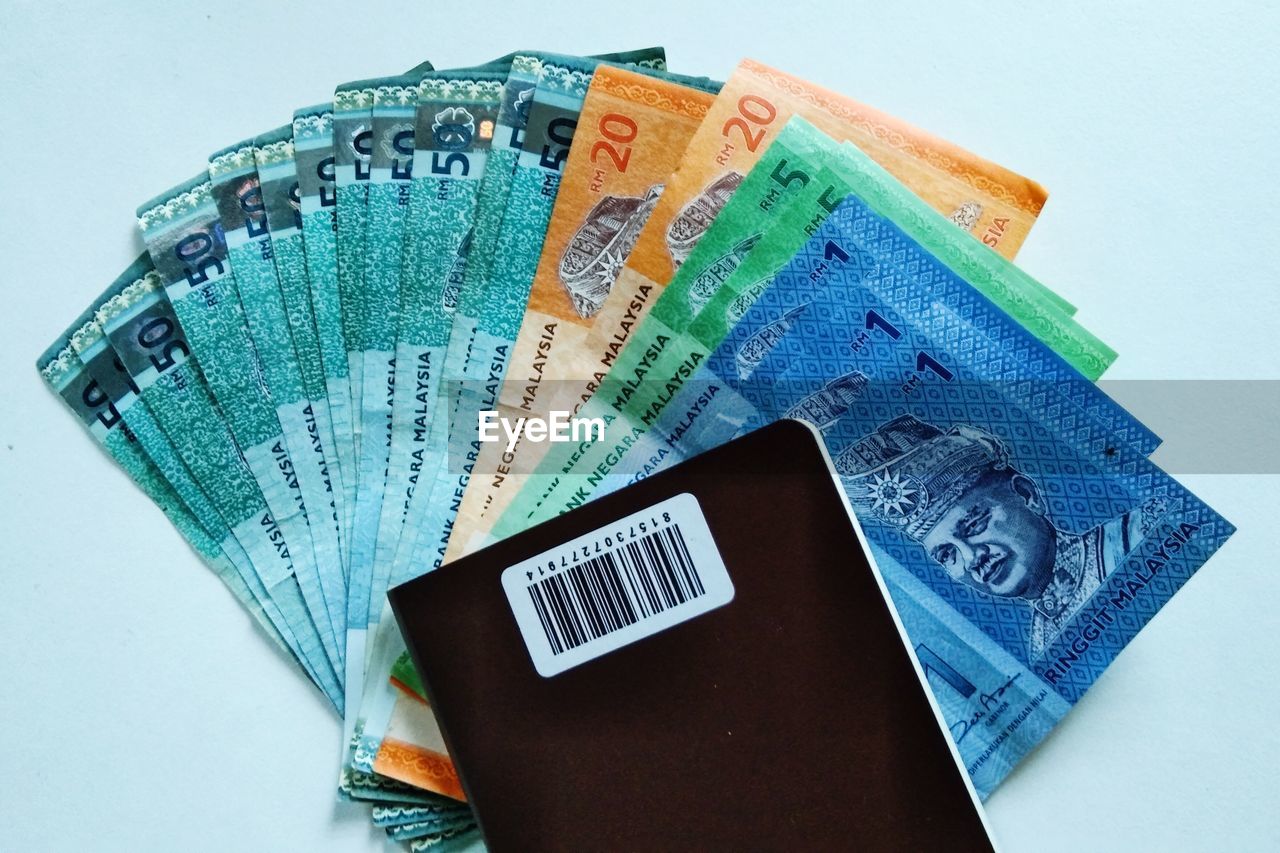 High angle view of malaysian ringgit on white background