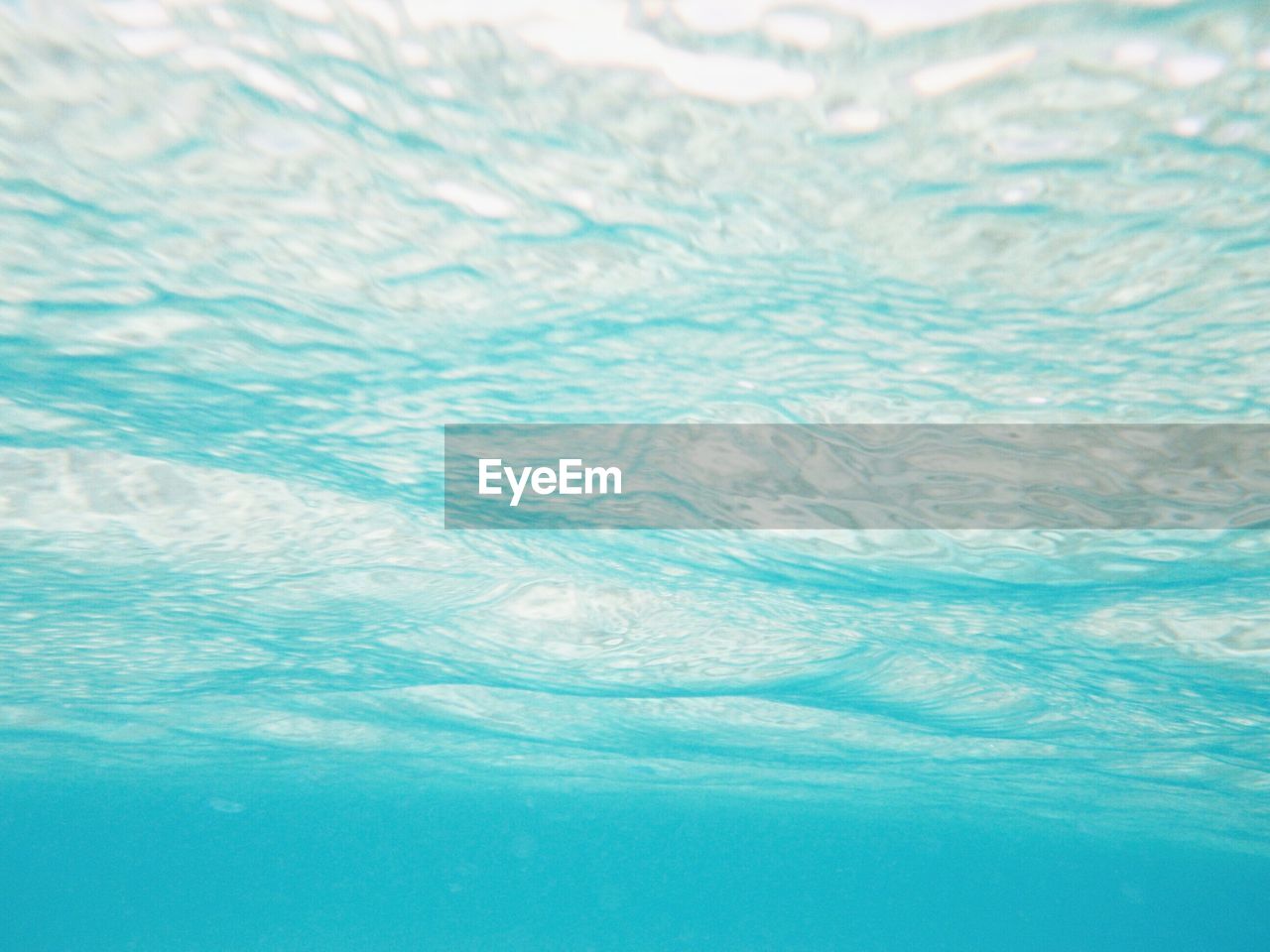 CLOSE-UP OF BLUE SEA