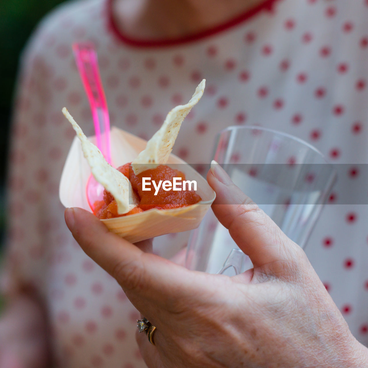 Midsection of person holding food