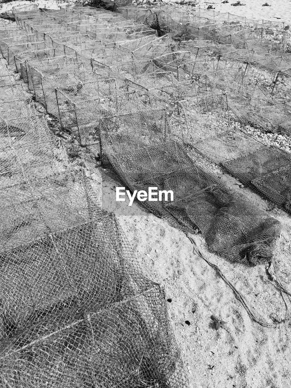 High angle view of fishing nets at beach