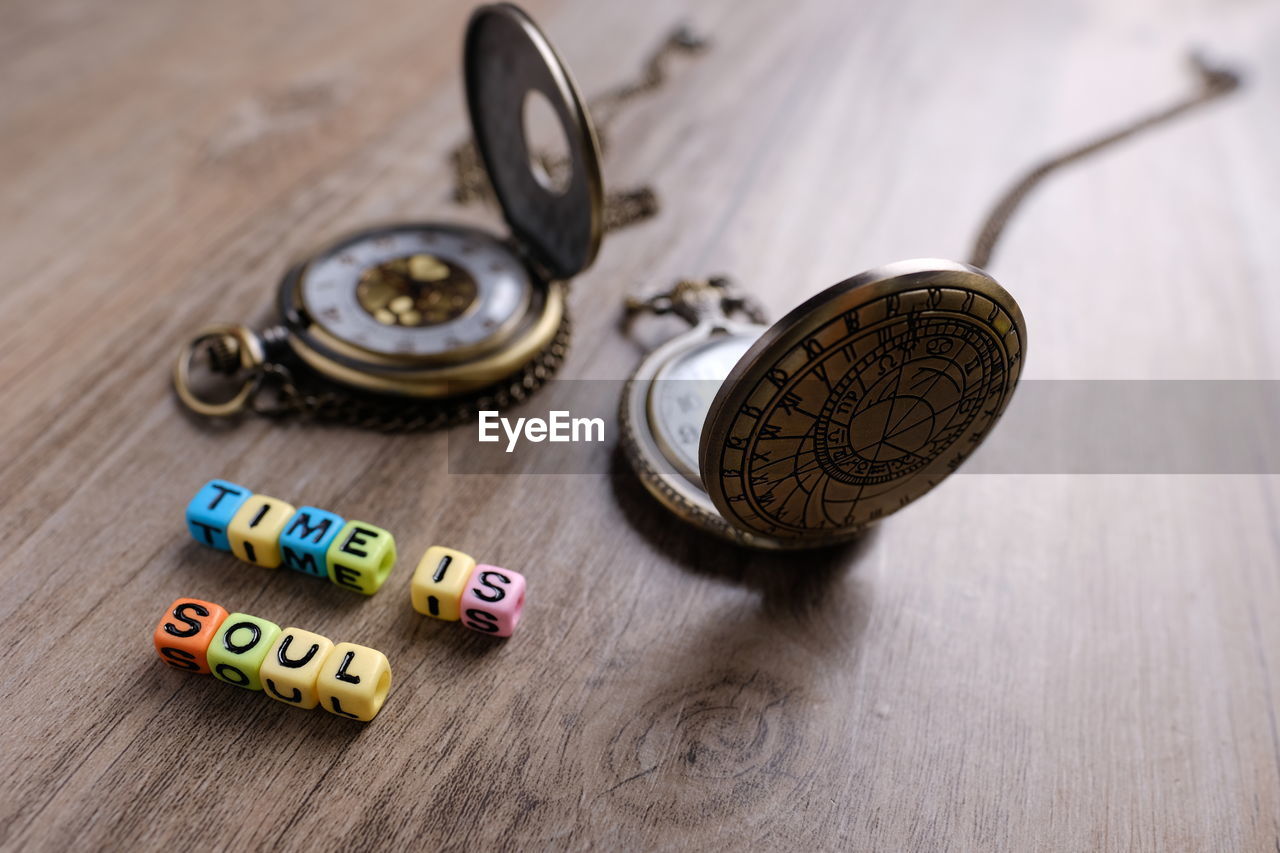 High angle view of text written toy blocks on table