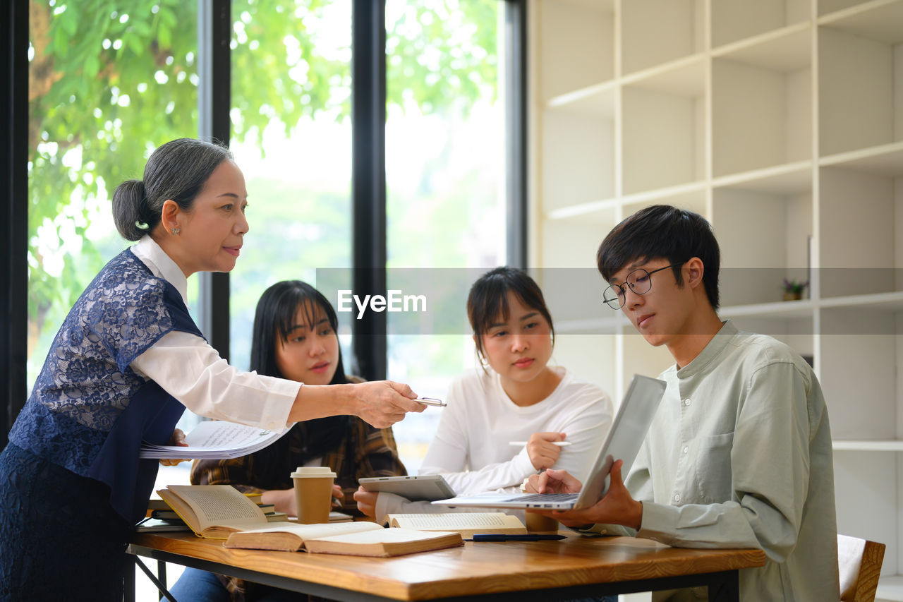 business colleagues working on table