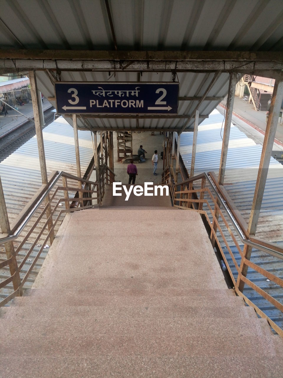 High angle view of steps leading towards railroad station platform