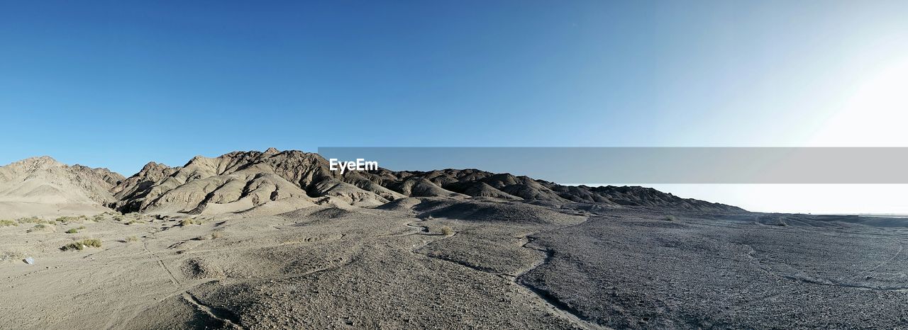 Scenic view of mountains against clear sky