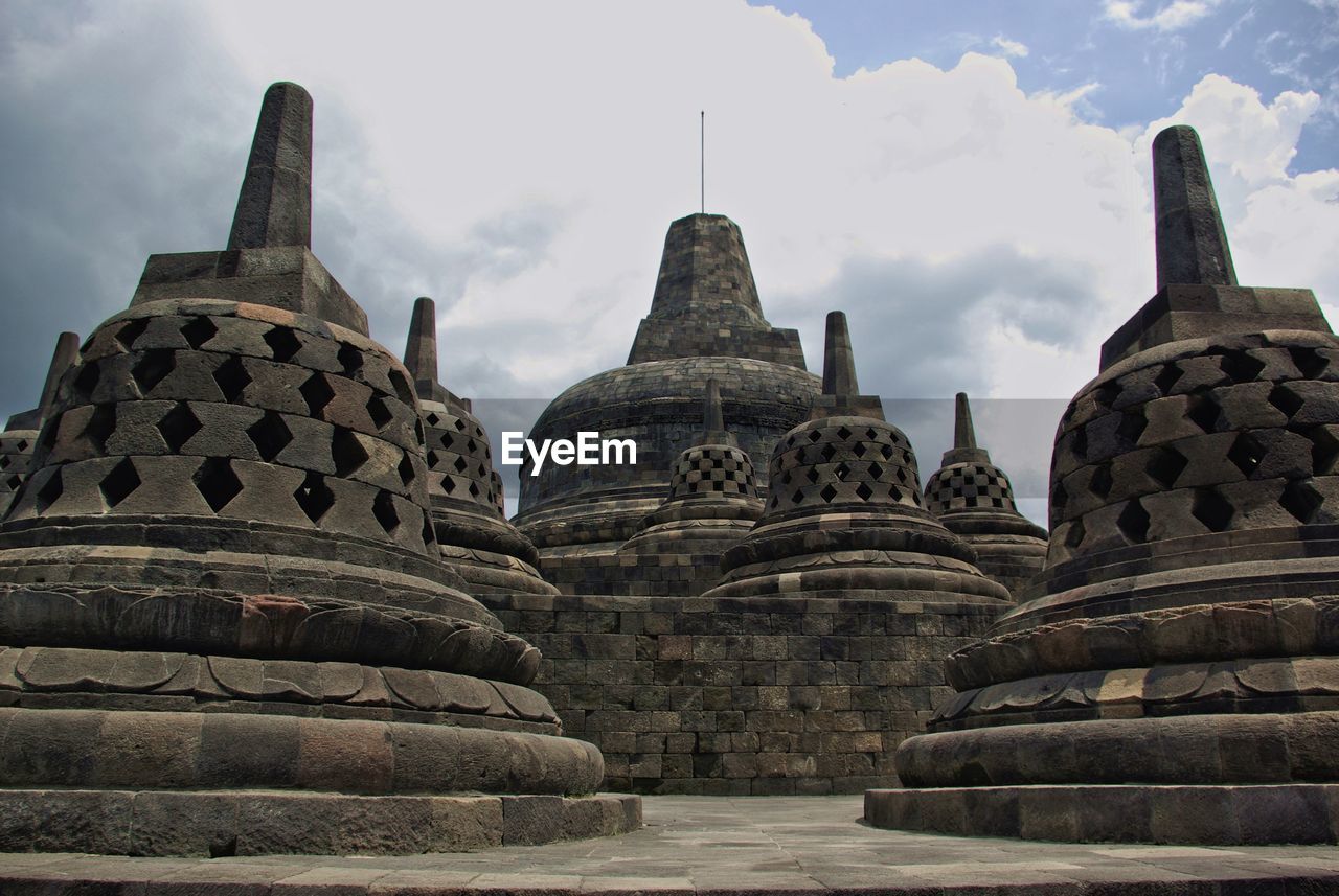 View of temple against cloudy sky