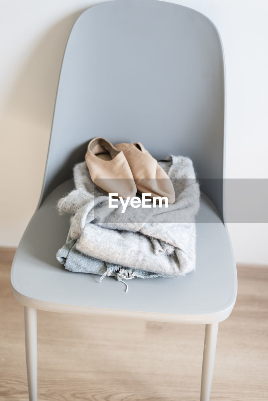 Clothes on chair at home