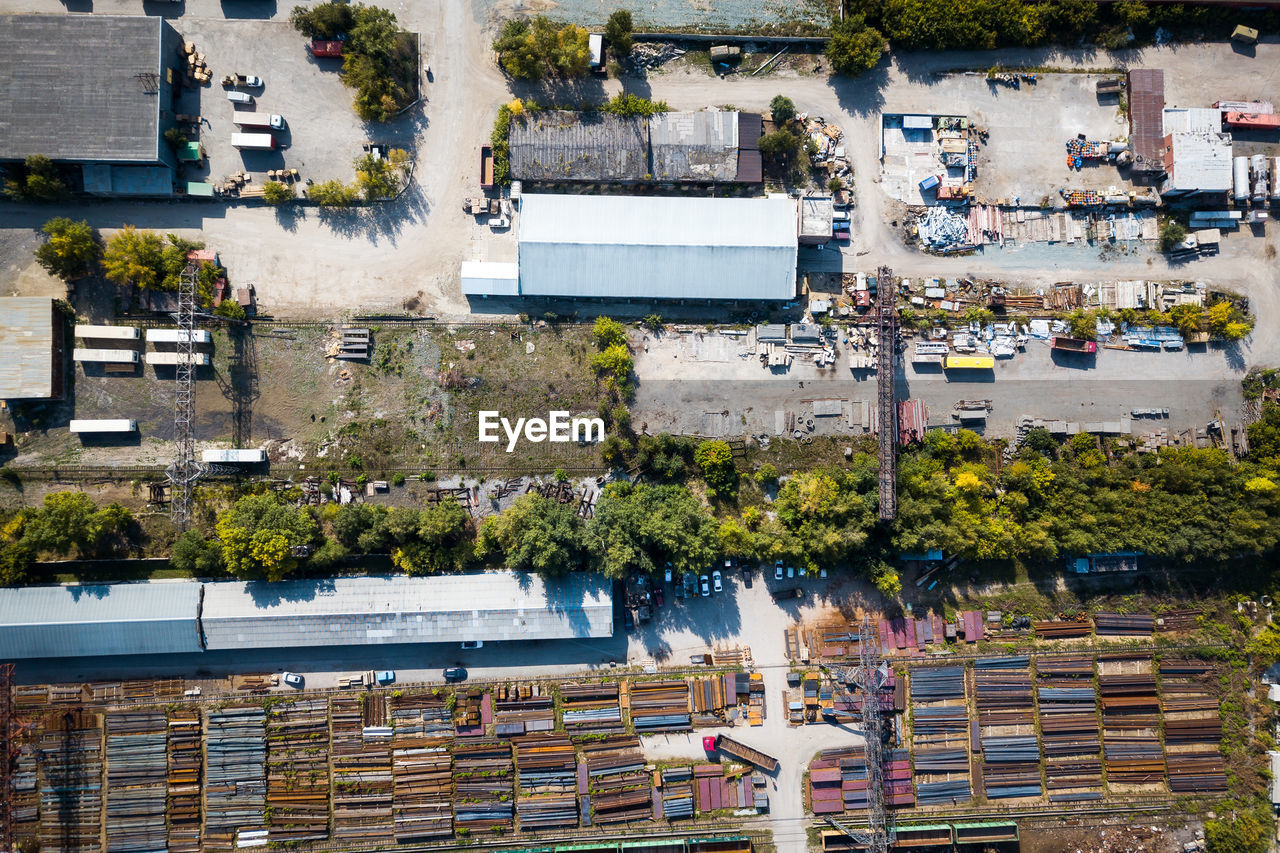 Top view of the industrial zone garages, warehouses, containers for storing goods. 