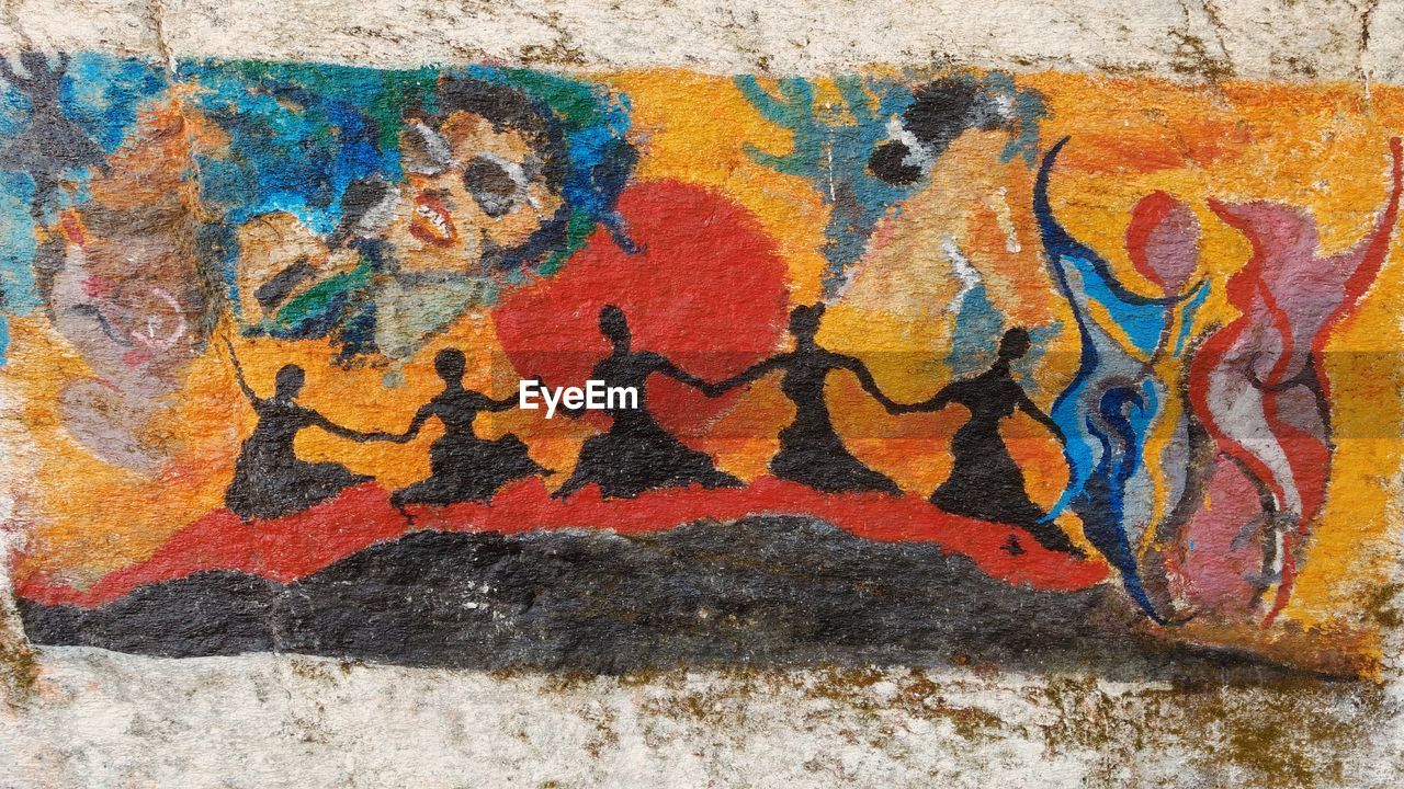 CLOSE-UP OF PAINTING ON WALL