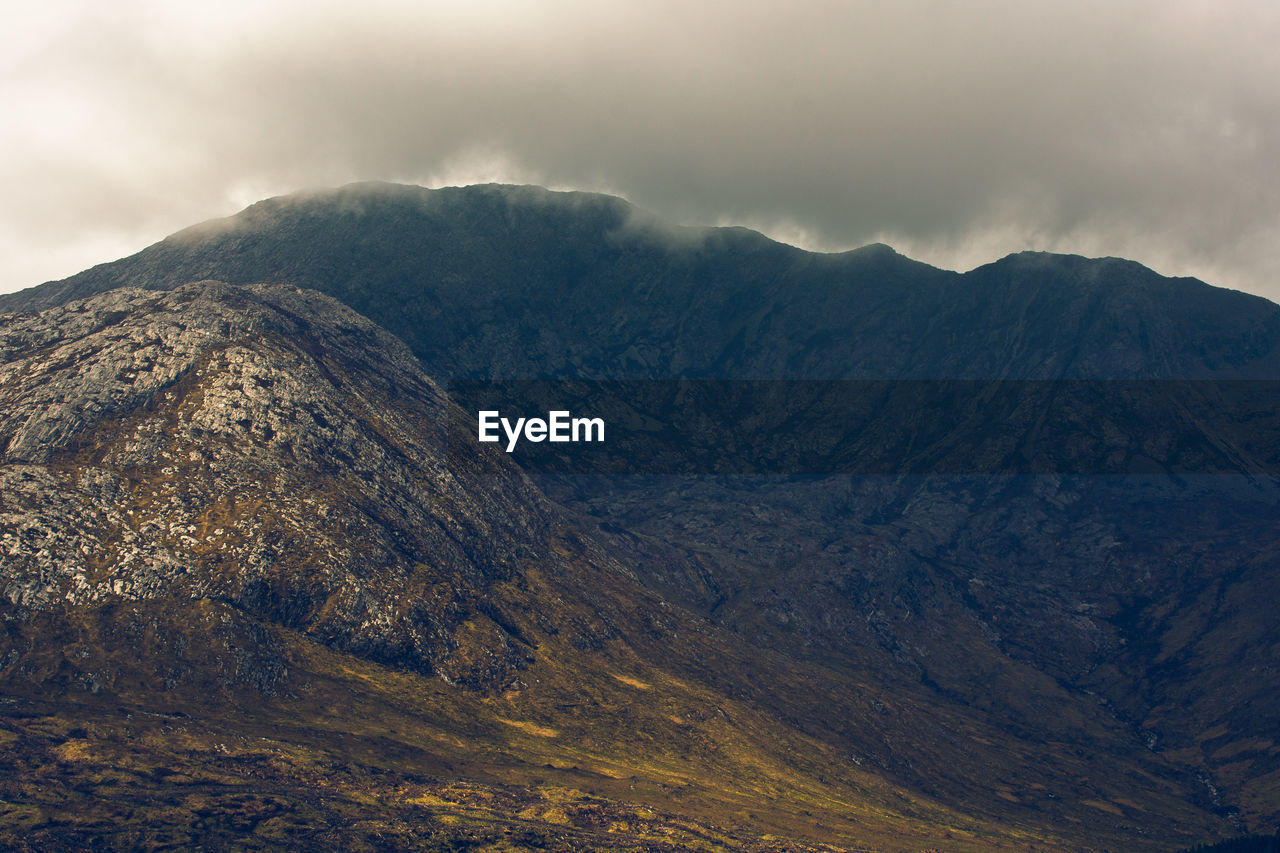 SCENIC VIEW OF MOUNTAIN AGAINST SKY