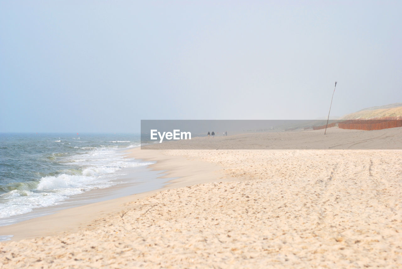 BEACH AGAINST CLEAR SKY