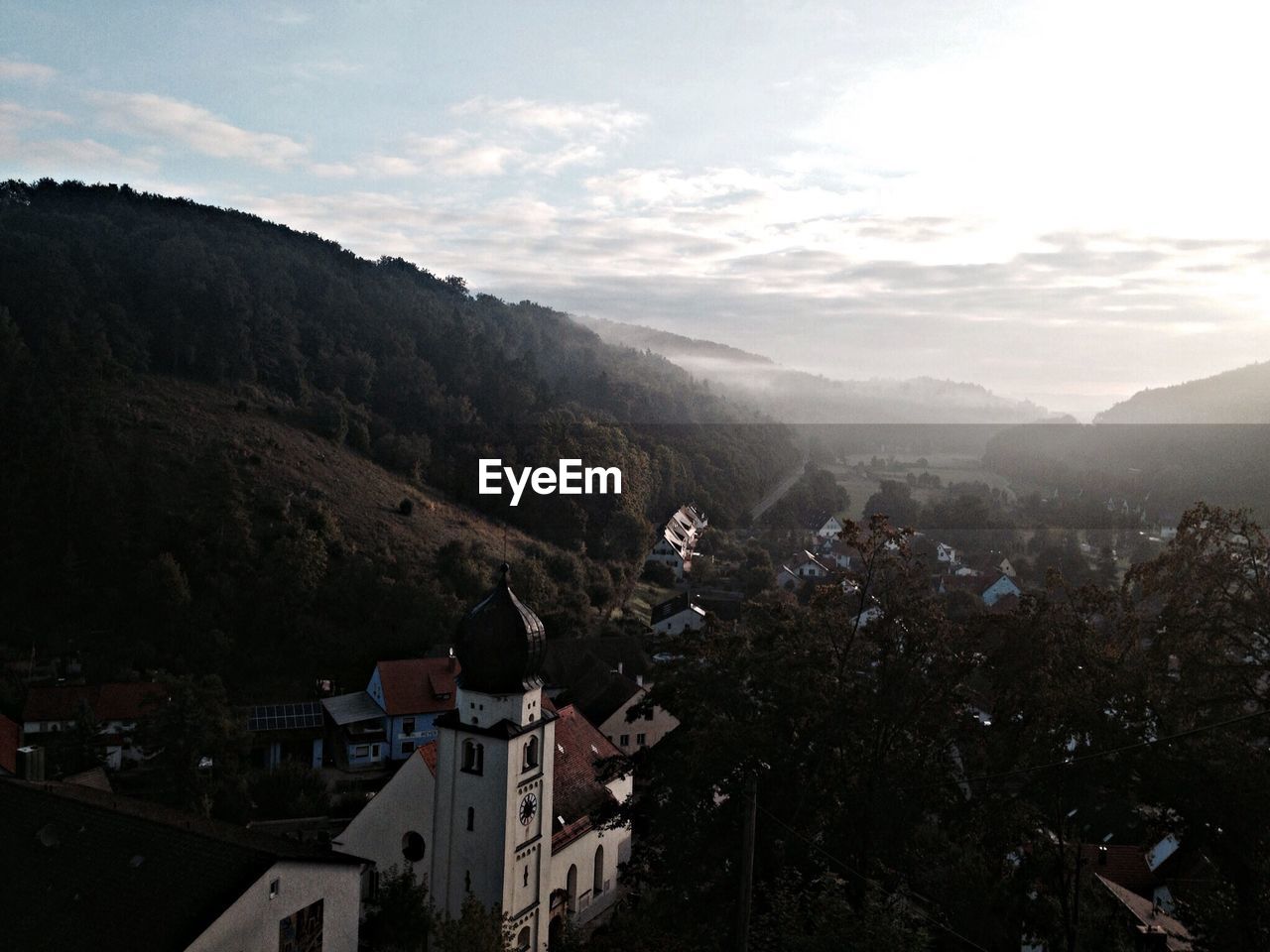 High angle view of townscape and mountains