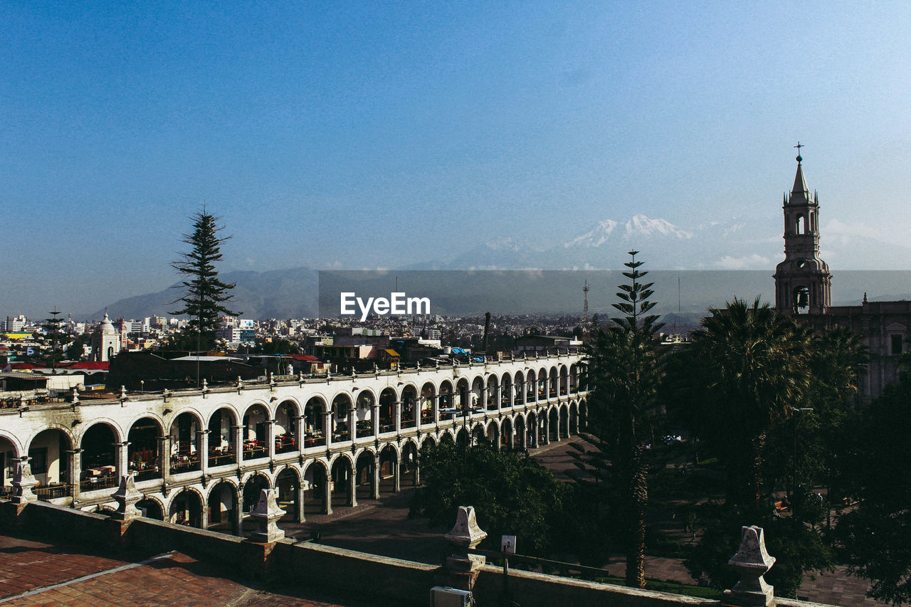 View of historic building in city against clear sky