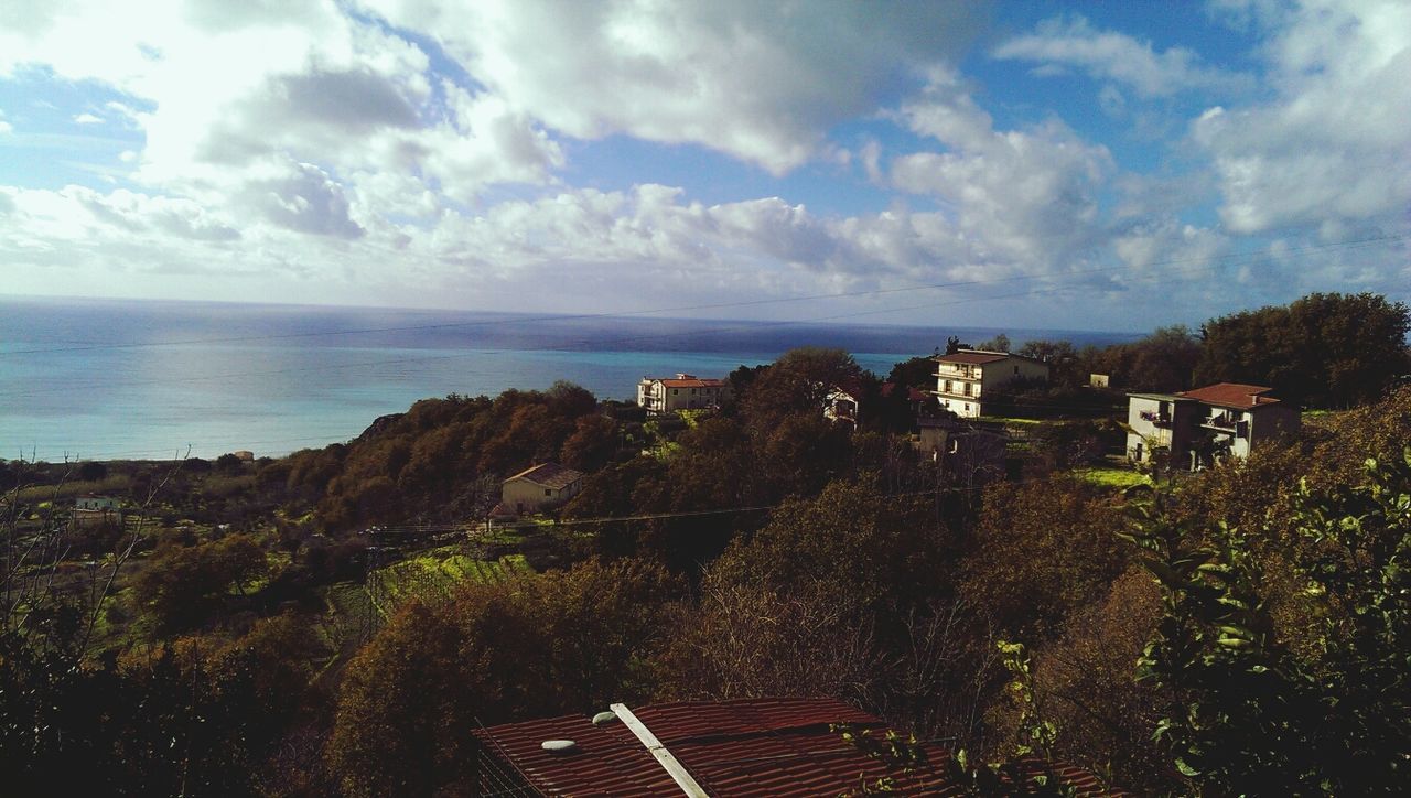 VIEW OF SEA AGAINST CLOUDY SKY