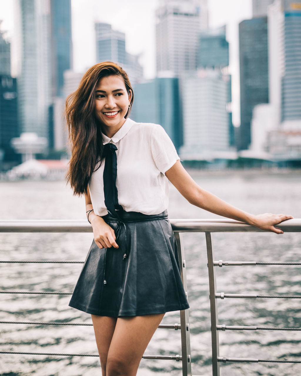 PORTRAIT OF A YOUNG WOMAN SMILING