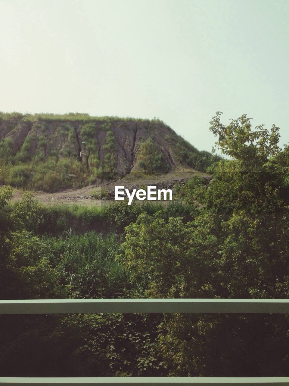 Scenic view of mountain against clear sky