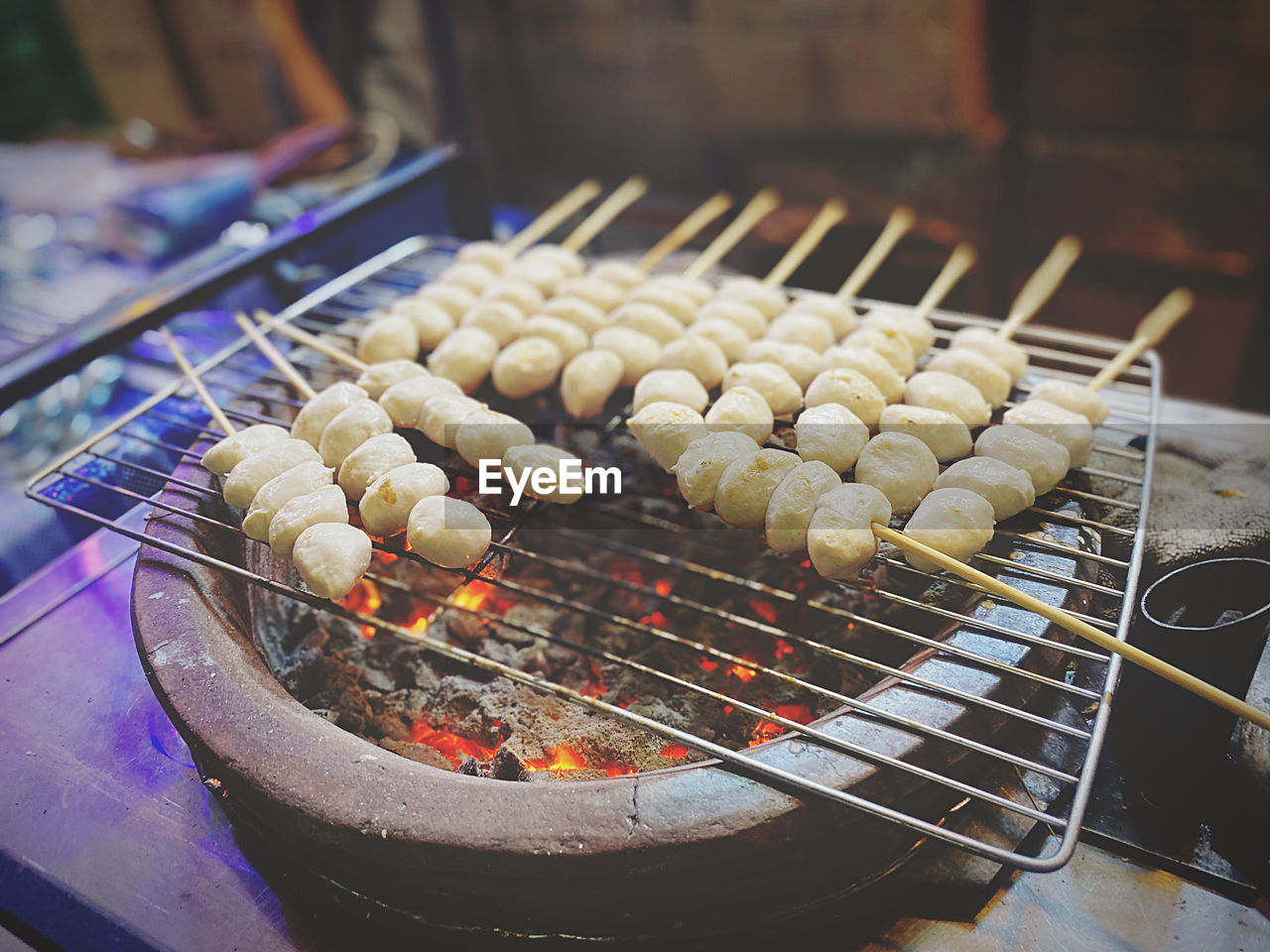 Close-up of meat on barbecue grill