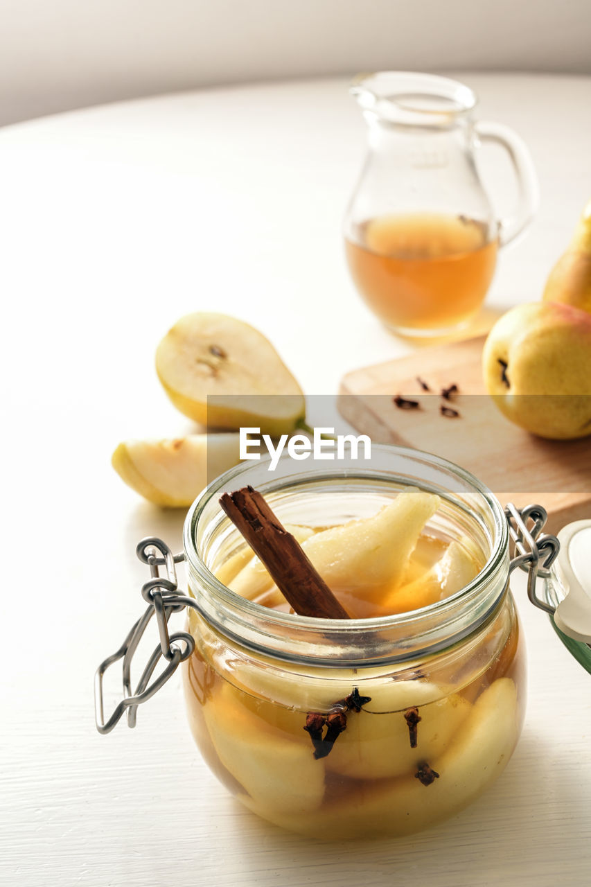 CLOSE-UP OF DRINK IN GLASS JAR