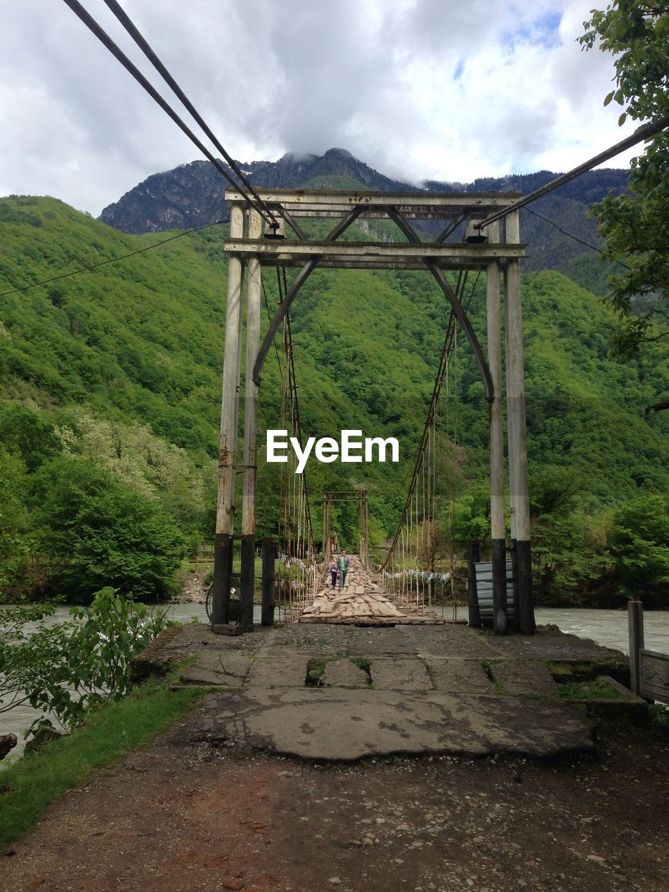 VIEW OF RAILROAD TRACKS AGAINST SKY