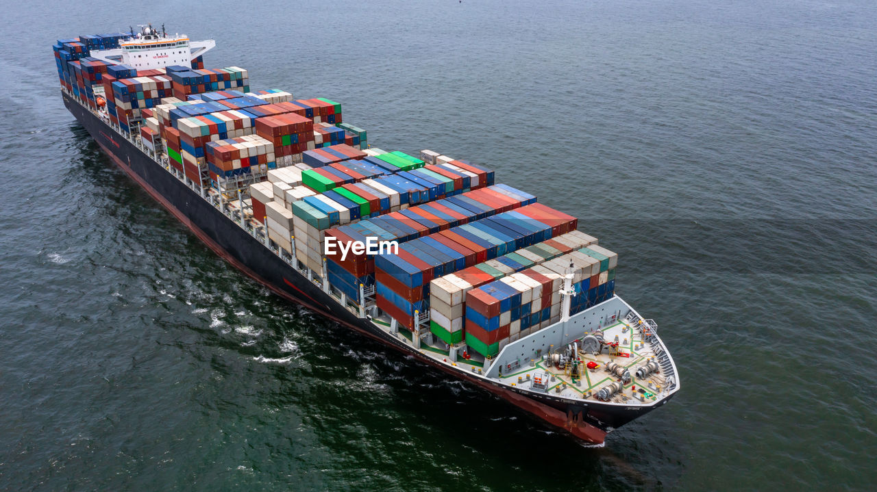 Aerial view container ship cargo freight shipping maritime vessel, global business supply chain.