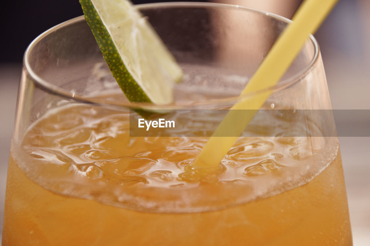 Close-up of orange juice in glass