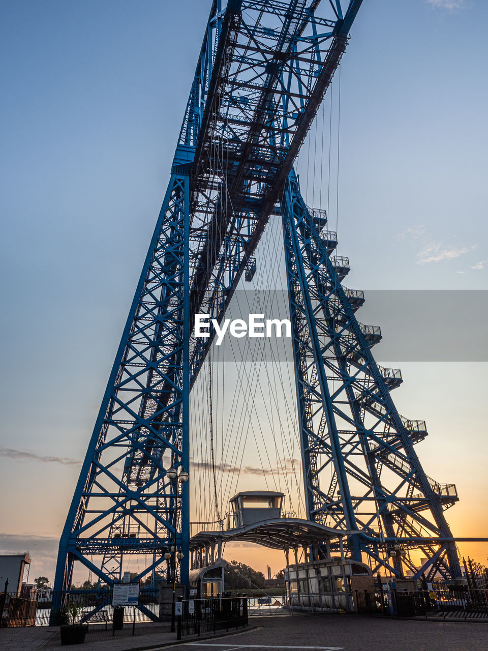 Middlesbrough transporter bridge at sunrise. it carries people and cars  in a suspended gondola