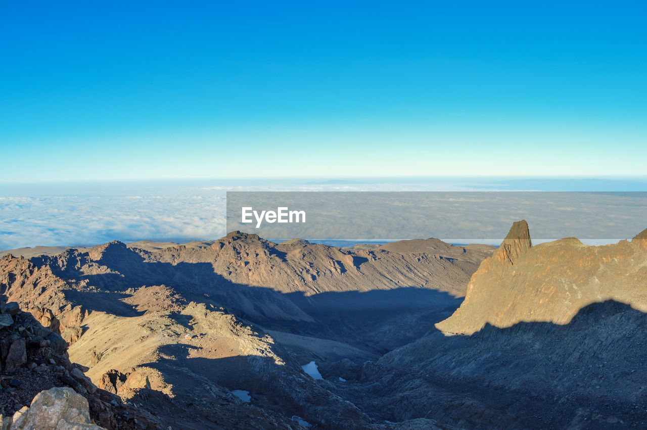 Volcanic rock formations above the clouds at mount kenya, mount kenya national park, kenya