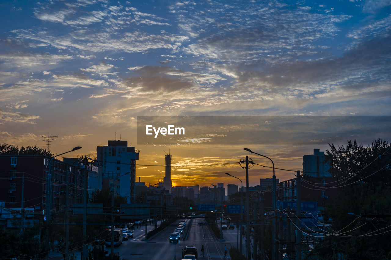 VIEW OF CITY AT SUNSET