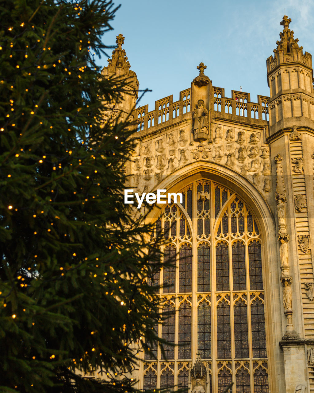 Low angle view of illuminated building against sky bath abbey