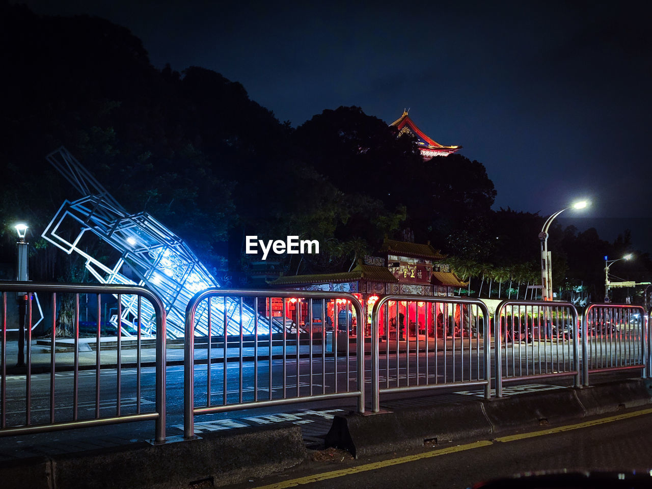 high angle view of illuminated bridge against sky at night