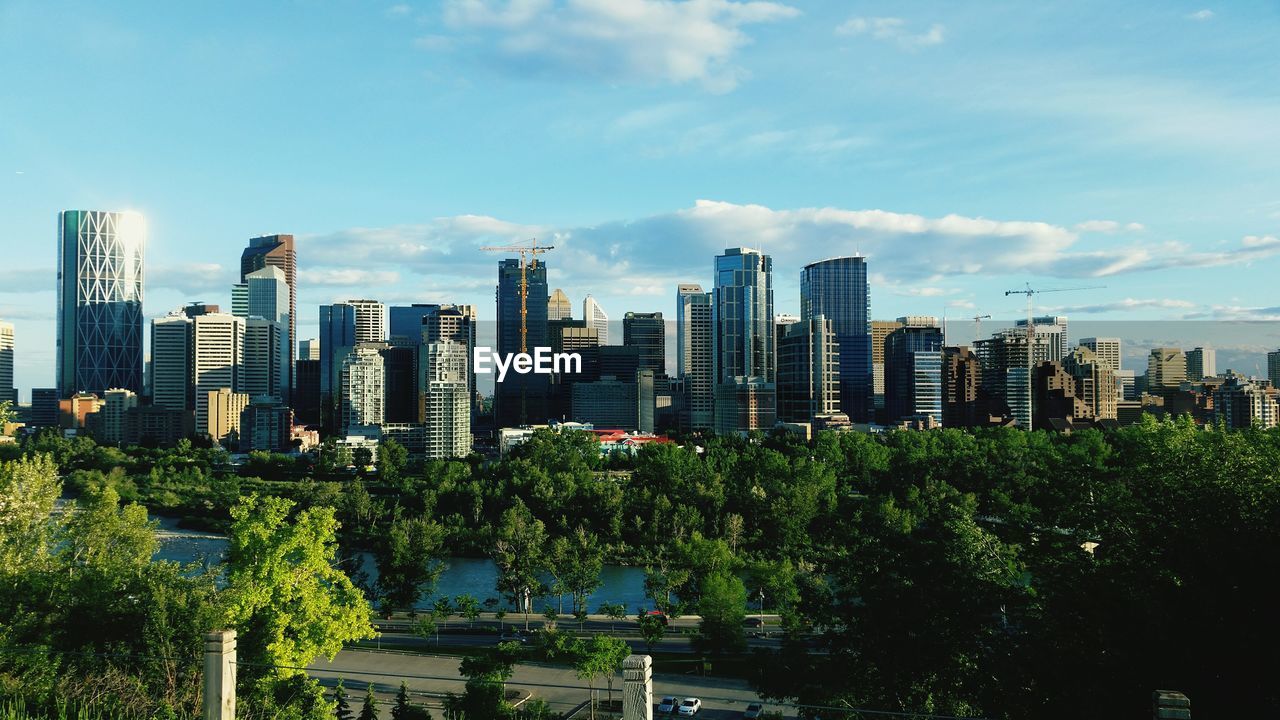 Modern skyscrapers in city against sky