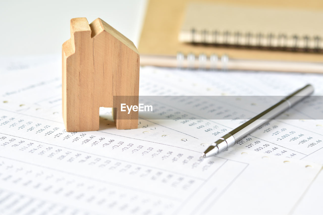 HIGH ANGLE VIEW OF TEXT ON TABLE
