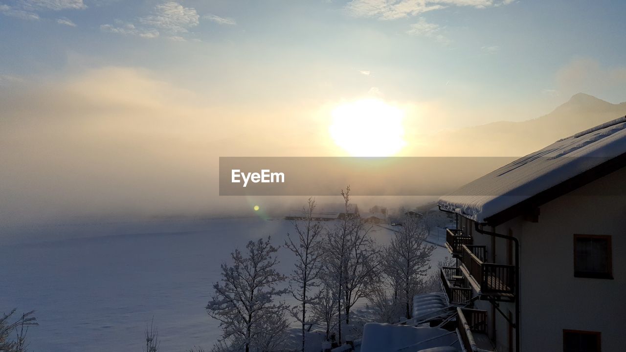 SCENIC VIEW OF BUILDING DURING SUNSET