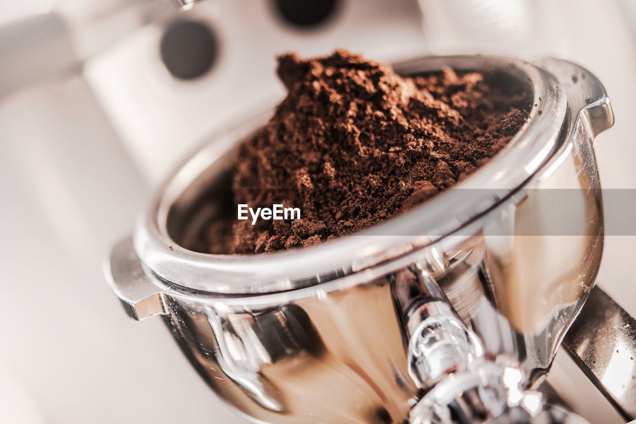 Close-up of coffee powder in grinder