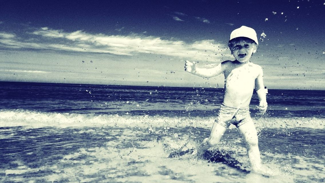 WOMAN JUMPING ON SHORE