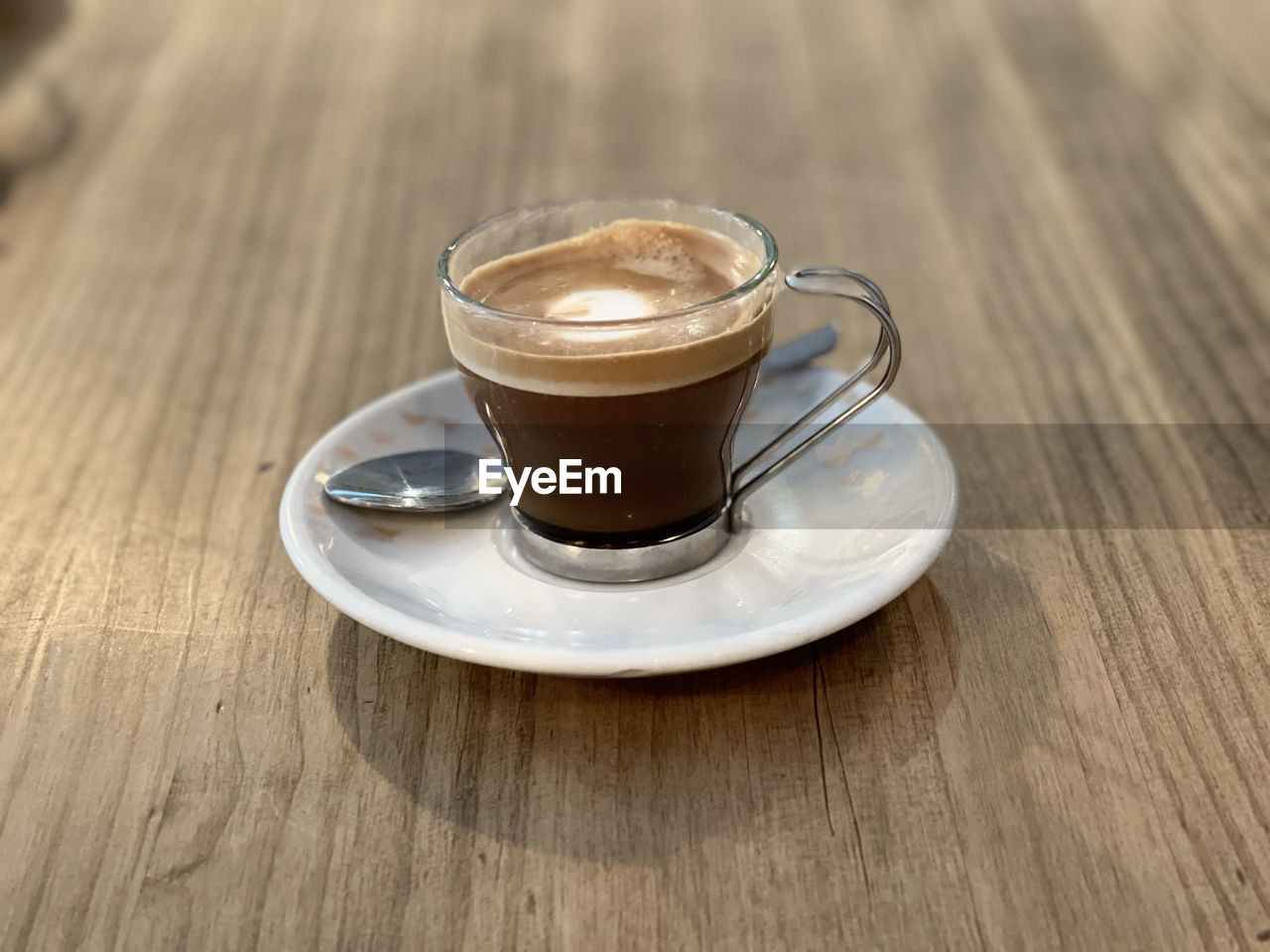 Close-up of coffee cup on table