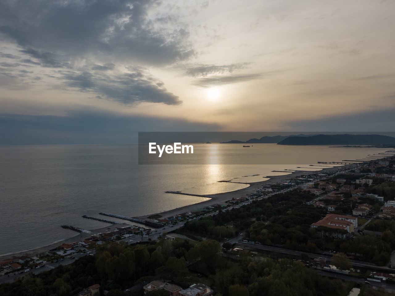 High angle view of sea against sky during sunset