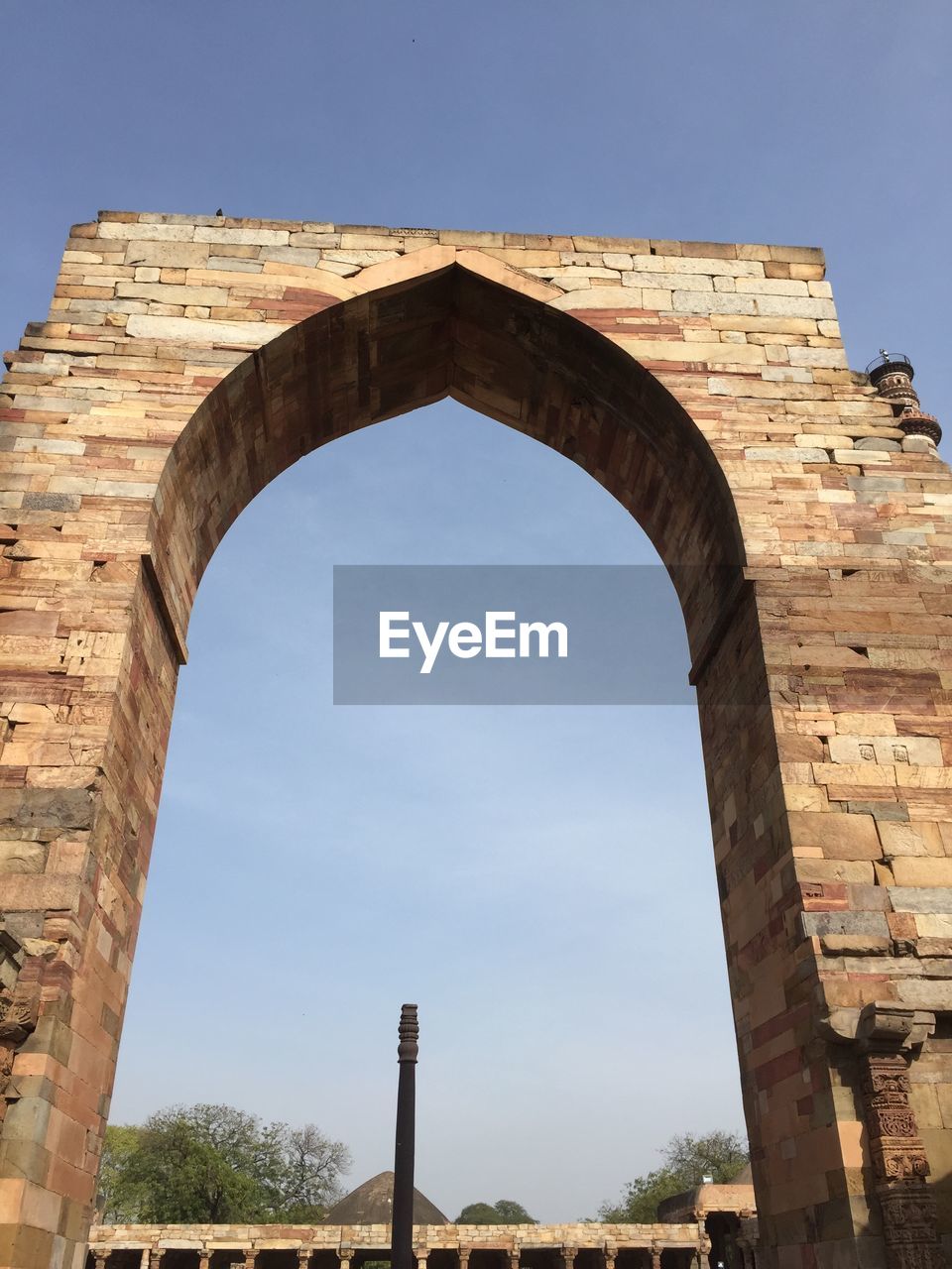 Low angle view of old arch against clear sky
