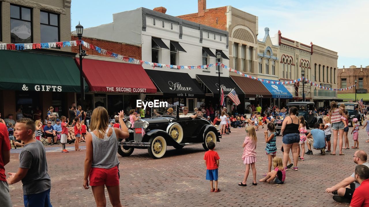 PEOPLE ON TOWN SQUARE