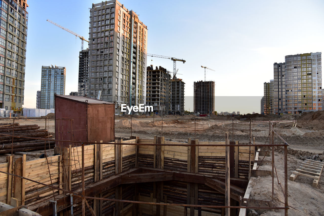 View on the large construction site with tower cranes and buildings. construction 