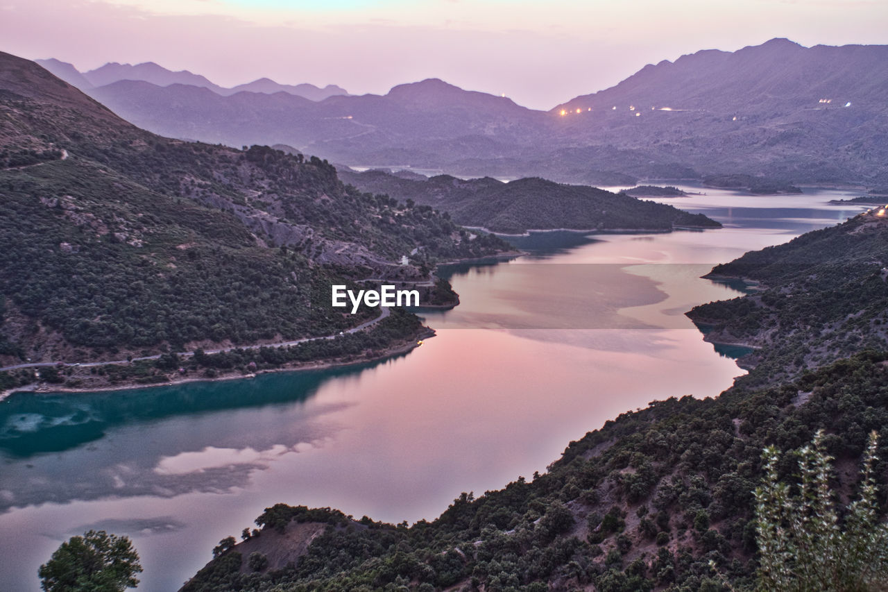 Scenic view of mountains against sky during sunset