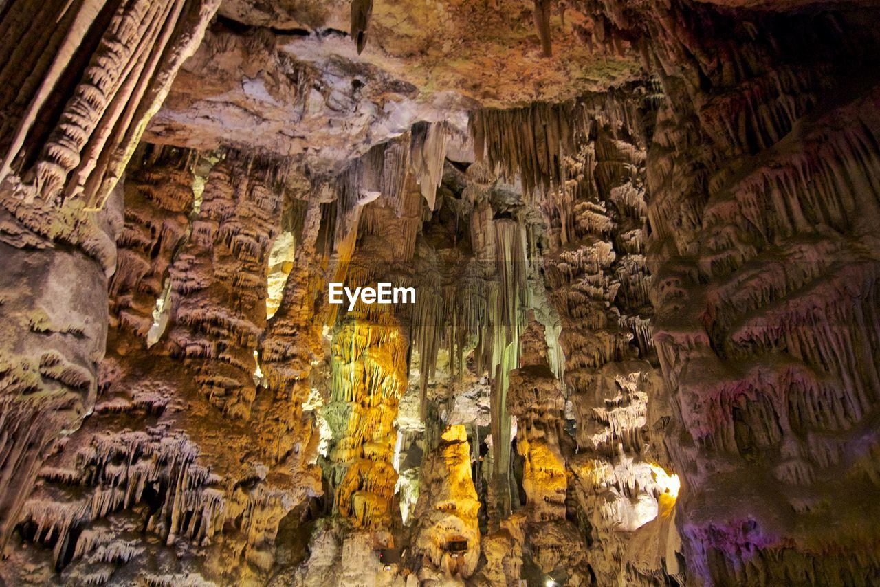 LOW ANGLE VIEW OF ROCK FORMATION