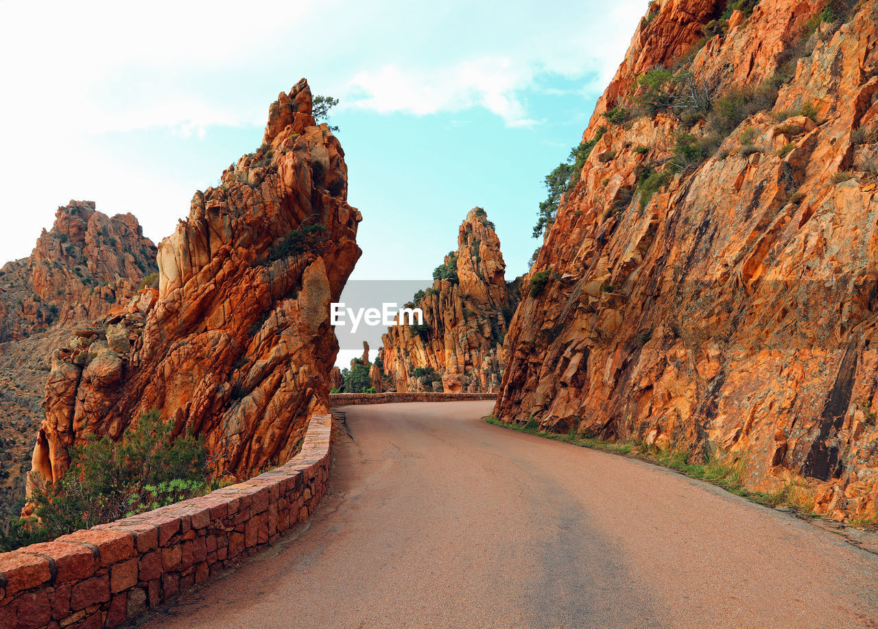 Road called d81 in corsica and the red rocks called les calanches